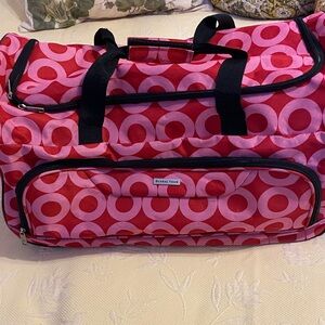 Global Tour Red and Pink Patterned Women's travel bag, minimal wear